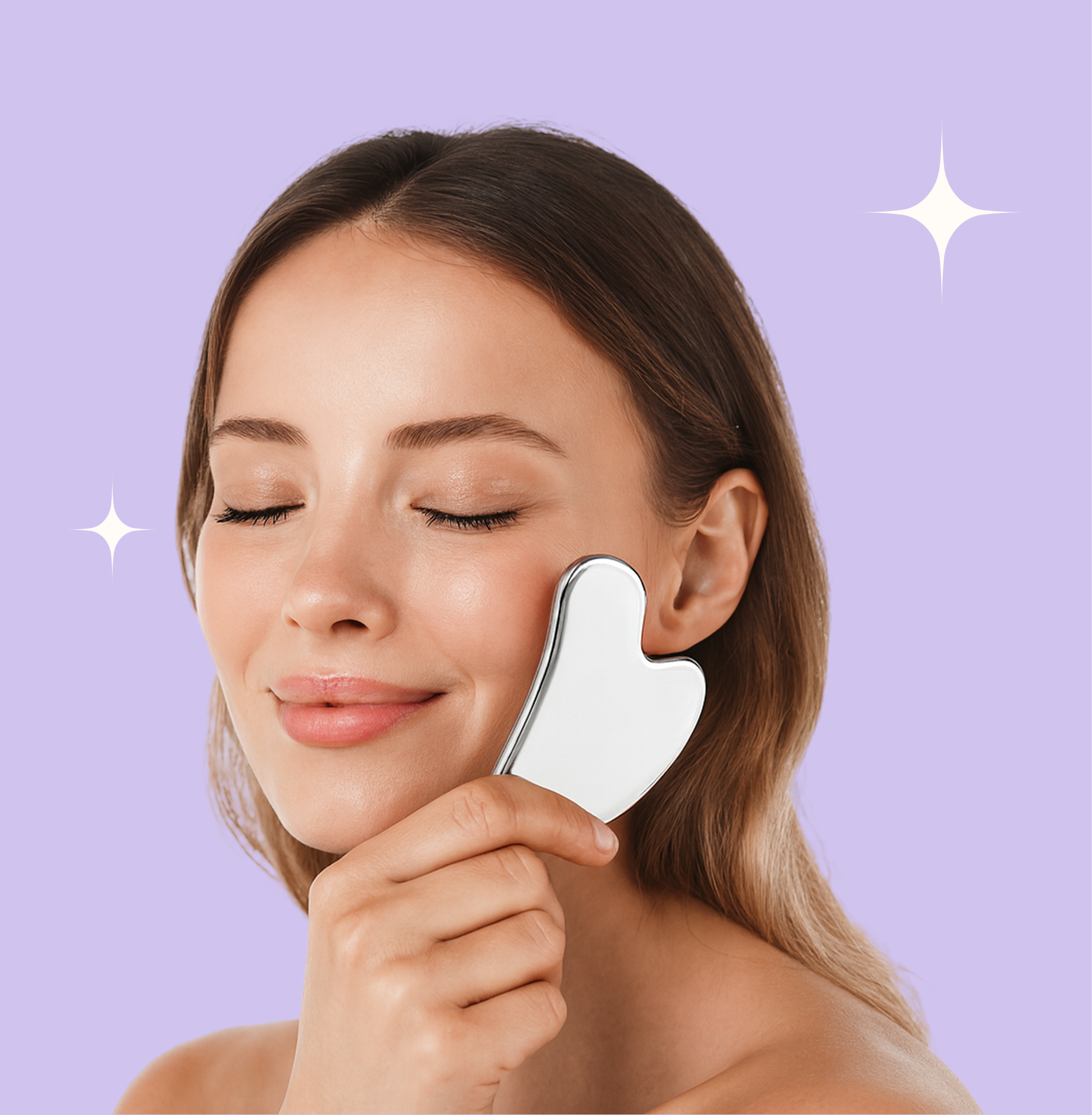 A woman holding cleopatra ceylon stainless steel gua sha